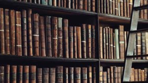 Old books of a library on a shelf