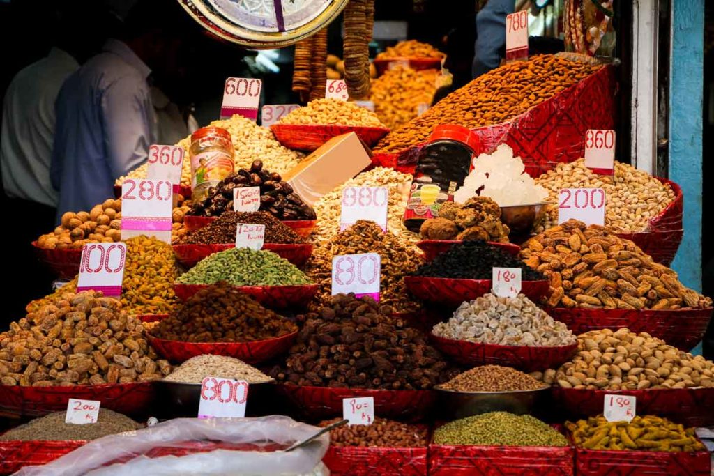 Dry fruits in different colours on a stall