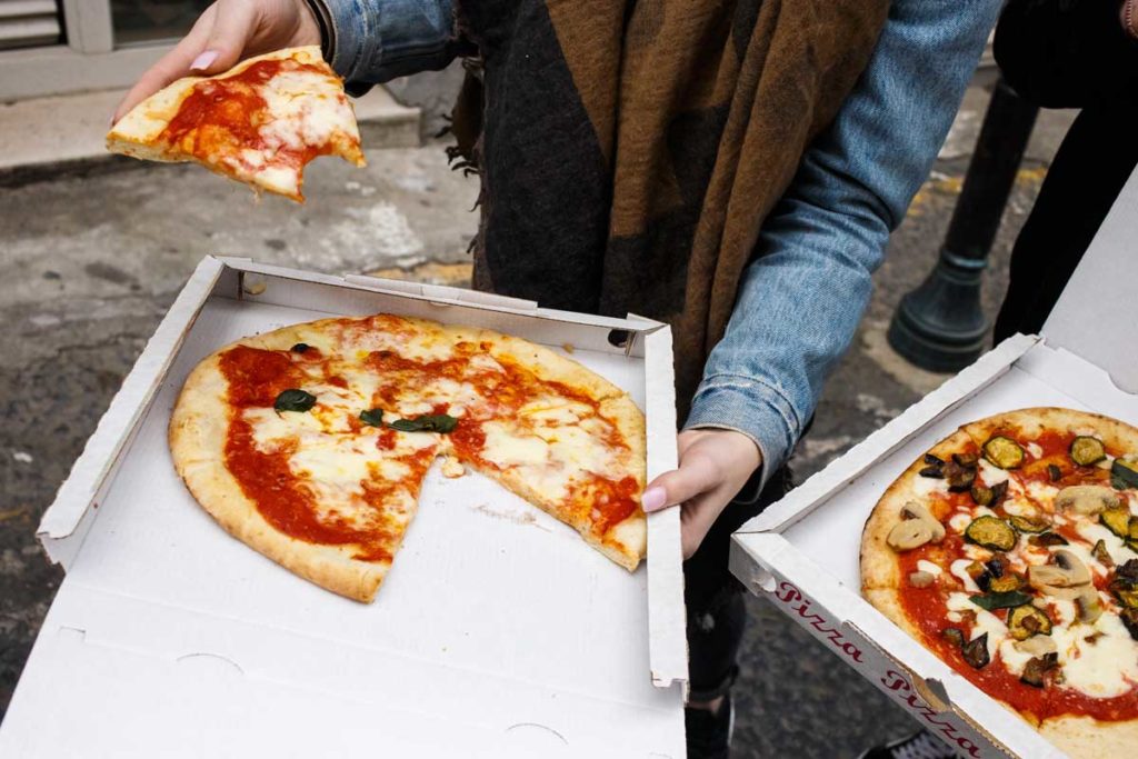 Pizza for take-away in Naples, one of the best cities for foodies