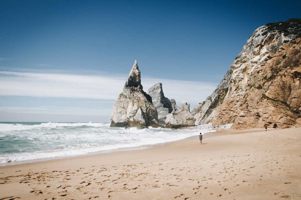 Beach and different rock shapes of the Praia da Ursa bay