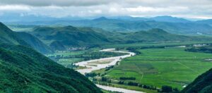valley in North Korea rising next to the river