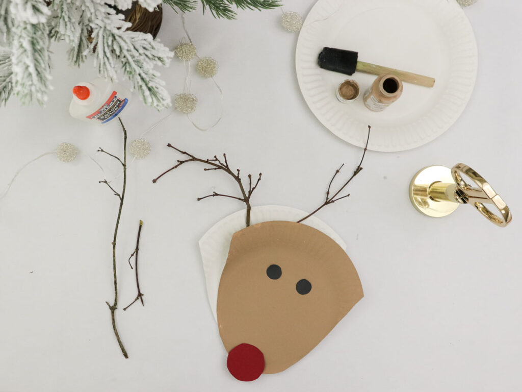 Step 6 in making a Rudolph plate with the children - glue the plate shapes to each other
