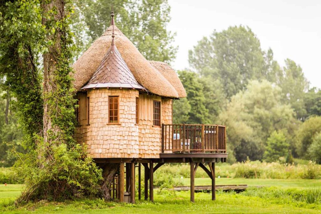 A beautiful hut on stilts set among nature is a glamping destination