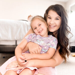 Katelyn, our guest DIY writer, and her daughter smile at the camera