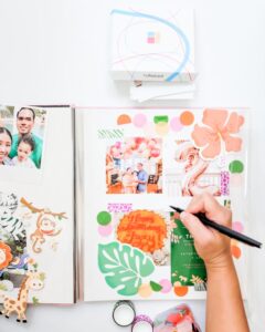 Writing dates and descriptions to complete the last step of this birthday scrapbook tutorial