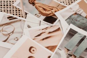 A selection of peach toned photos scattered