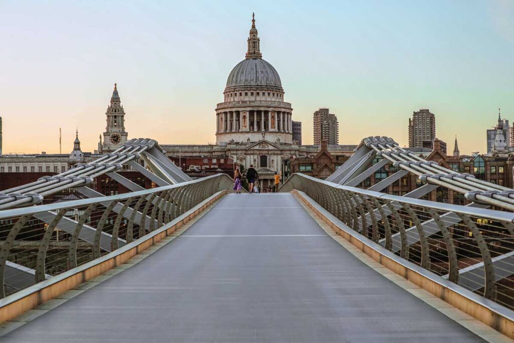 Millennium Bridge in London stretching away towards St Paul's Cathedral