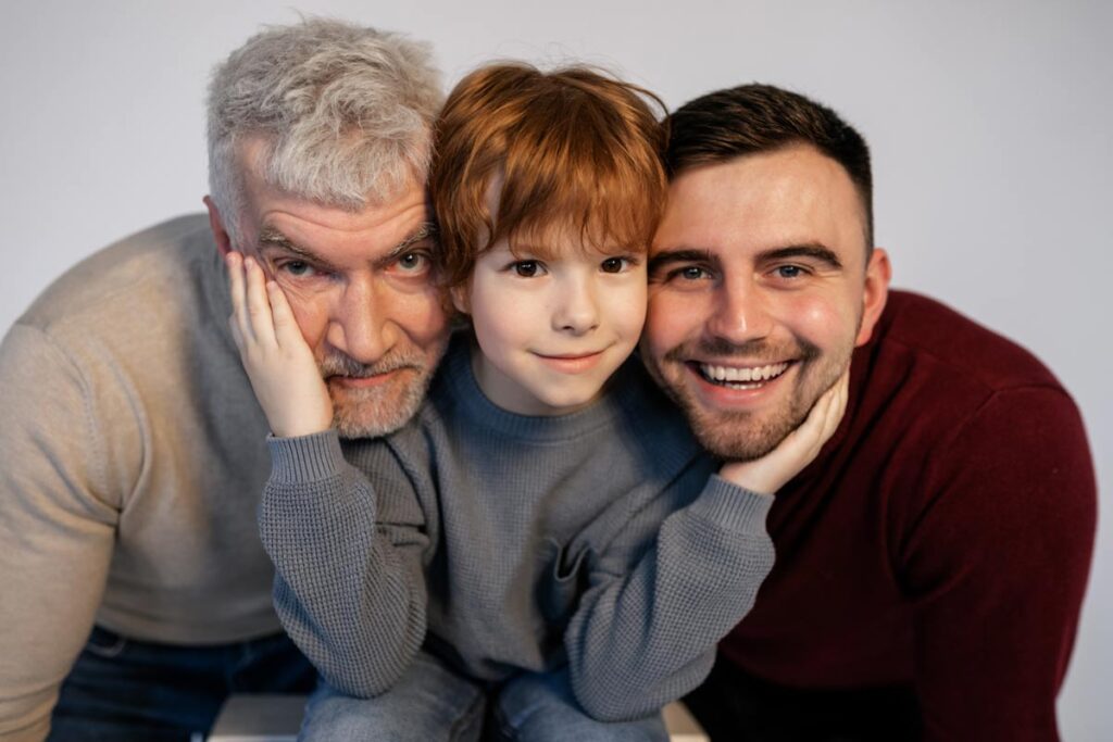 3 generations of dads and sons pose together for father's day